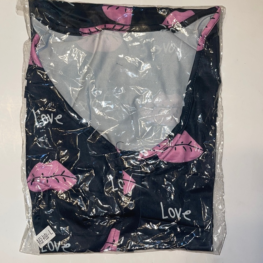 Brand new never opened shorts onesie